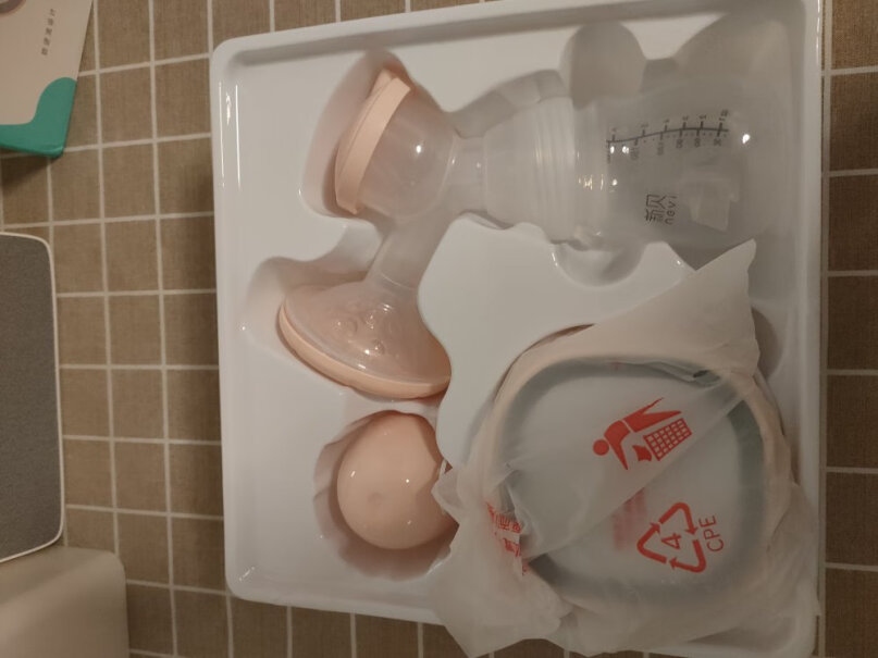 新贝电动吸奶器带哺乳灯请问大家买的这个清洗时候这个交接处会出水吗？