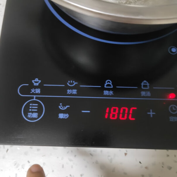 美的电磁炉大功率家用智能触黑晶面板炒菜容易冒烟是怎么回事？