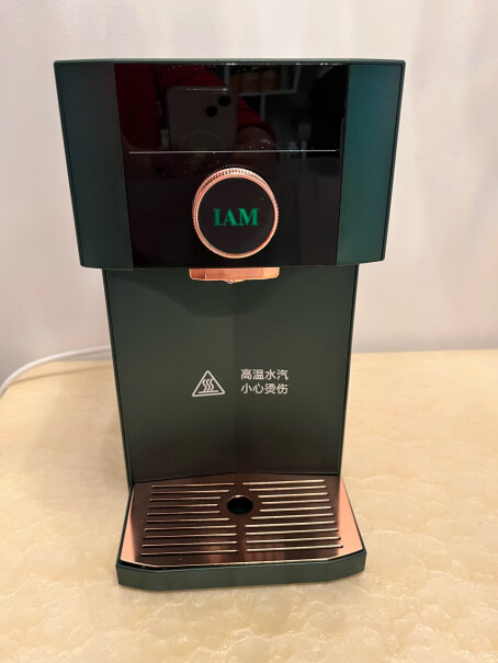 IAM即热式饮水机小型桌面台式迷你全自动智能即热饮水机不用水的时候还会用电吗？