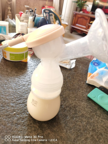 新贝电动吸奶器带哺乳灯这个吸得痛吗？