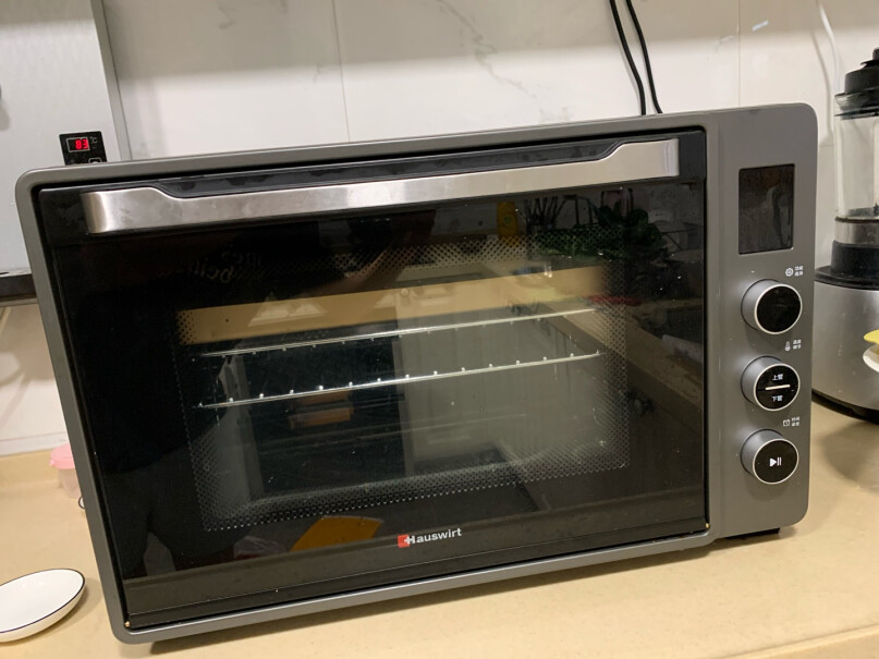 海氏电烤箱75升家用商用专业烘焙多功能大容量这个烤箱好清洁吗？能上下两层一起烤曲奇吗？