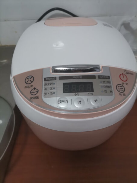 美的智能电饭煲家用一杯米煮粥放多少毫升水？
