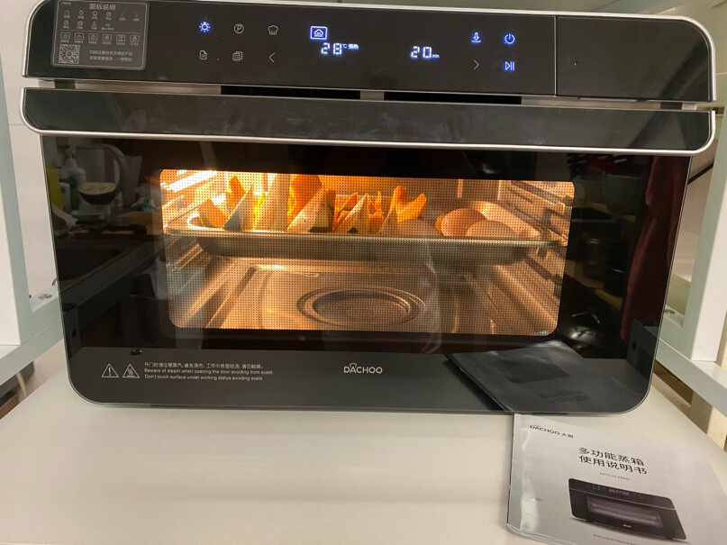 大厨蒸烤箱一体机家用台式烤箱蒸箱蒸烤一体机炸锅DB600请问这个预热和烤制过程中有异味吗？如电线皮或塑料的焦煳味。