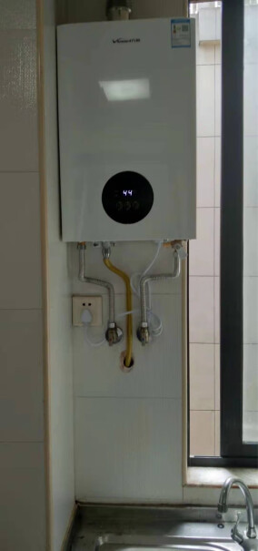 万和12升燃气热水器智能自适温控制面板是触摸按键还是能按下去的轻触按键？