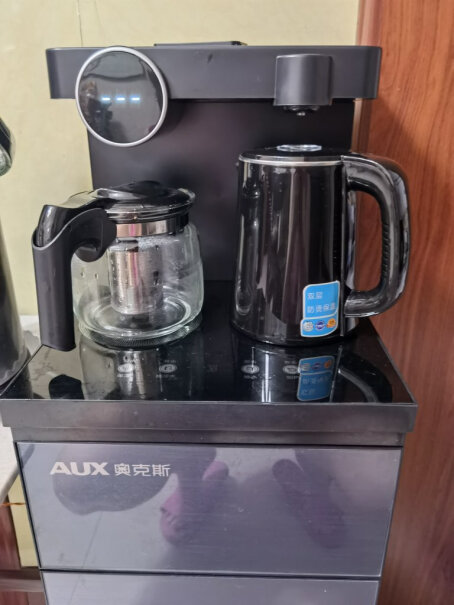 奥克斯茶吧机家用多功能智能遥控温热型立式饮水机烧出来的水有没有塑料味儿？