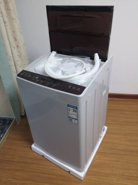 康佳洗衣机全自动8公斤波轮甩干脱水你们买的这款洗衣机甩干的时候洗衣机会跑吗？我刚用，洗衣机晃的都快飞起来了，底部放的也很平稳，怎么回事？