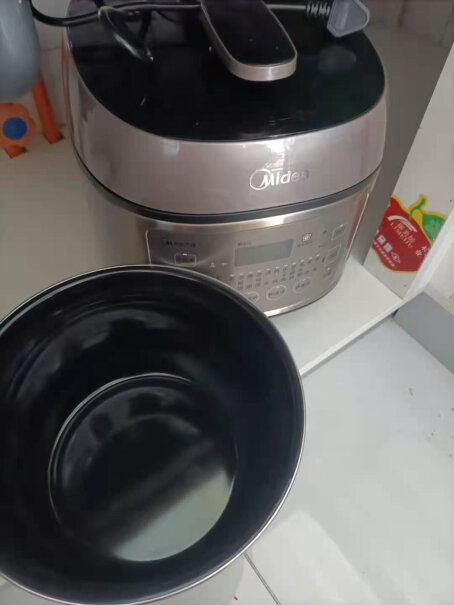 美的电压力锅5升双胆高压锅家用电压力锅煮饭饭的颜色会偏黑吗？