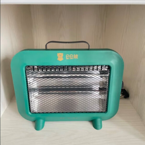 旦旦熊小太阳取暖器家用节能省电烤火炉小型桌面烤火器速热电暖气这个产品和空调比费电不？