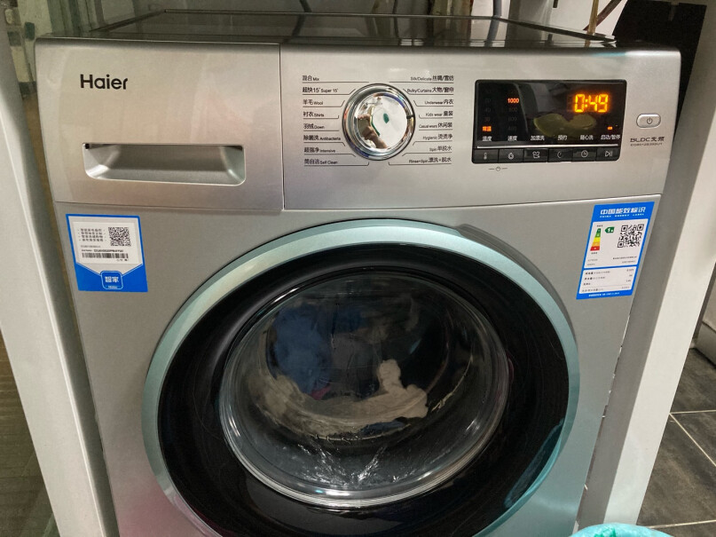 海尔（Haier超薄滚筒洗衣机全自动这款洗衣机是上排水，是否必须得自己再加一节排水管才能排水吗？我家的地漏就在机子的右下角，还是没发排水？