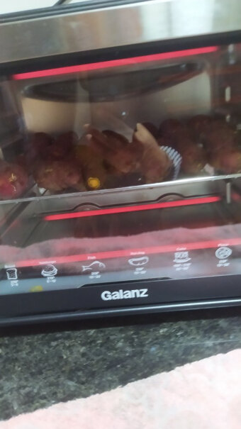 格兰仕电烤箱家用烘焙烤箱32升温度调节那个是松松的吗？