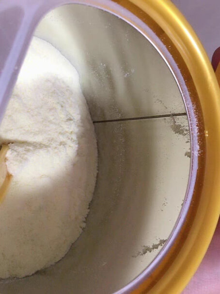 伊利奶粉新升级冲奶粉的时候粘瓶子是什么现象？