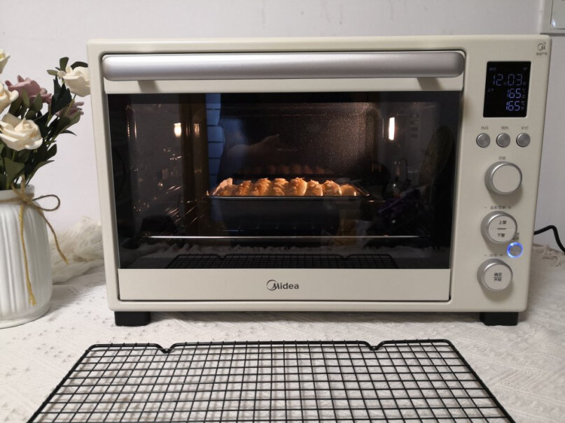 美的家用多功能电烤箱25升可以上下控温吗，