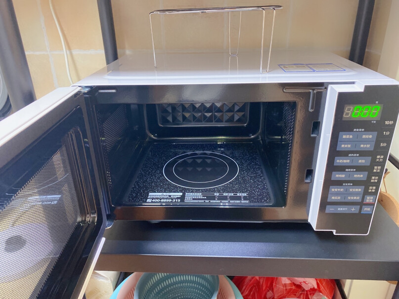 美的微烤一体机20升平板加热家用光波炉多功能微蒸烤箱里面是不锈钢还是喷漆的？