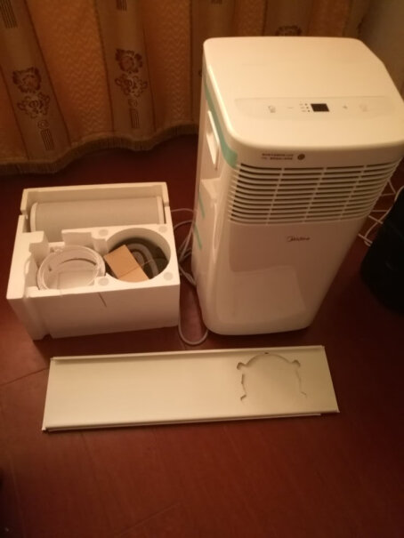 美的移动空调小1匹单冷家用厨房一体机免安装便捷立式空调大家开了冷空调出风口温度高吗？