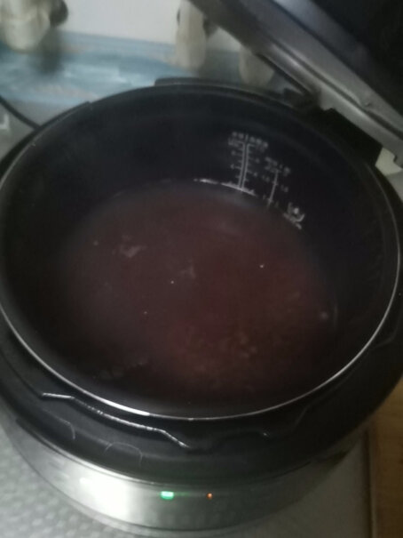美的电压力锅双胆高压锅焖出来的饭，会不会不散落，会不会有点粘？