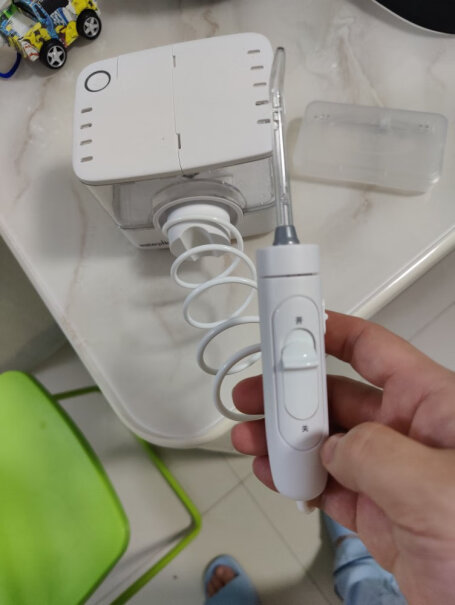 洁碧冲牙器请问，这款洗牙器，有没有收纳喷嘴费空间？