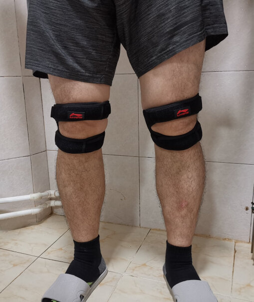 李宁髌骨带运动护膝护具固定式加压半月板保护髌腱护膝护腿冬天带在厚裤子外面有用吗？
