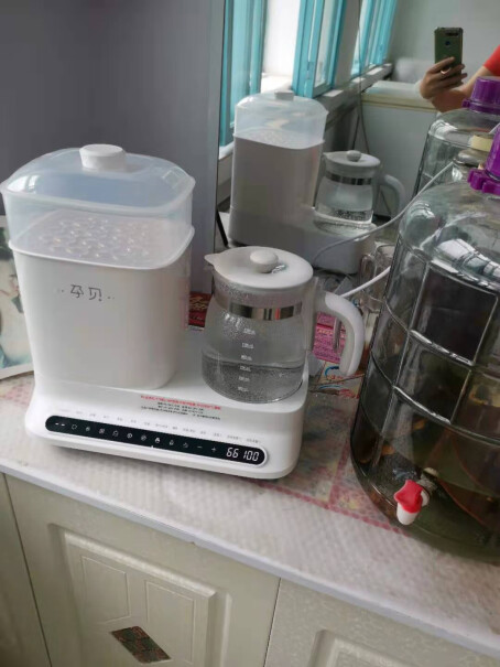 德国孕贝五合一恒温水壶温奶器恒温调奶器奶瓶消毒器这个消毒锅容易清洗吗？