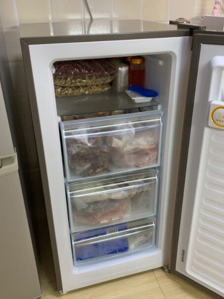 海尔148升分区大抽屉防串味家用立式冷柜平时用调几档？