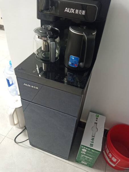 奥克斯茶吧机家用多功能智能遥控温热型立式饮水机可以放多大的水桶？