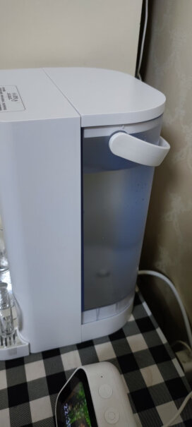 集米T2即热饮水机即热式饮水机你好，我问一下200水量我喝不了，怎么能提前停止，少接点？