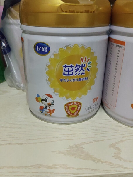飞鹤茁然-学护儿童配方奶粉你们买的奶粉罐上有没有塑料薄膜包装？