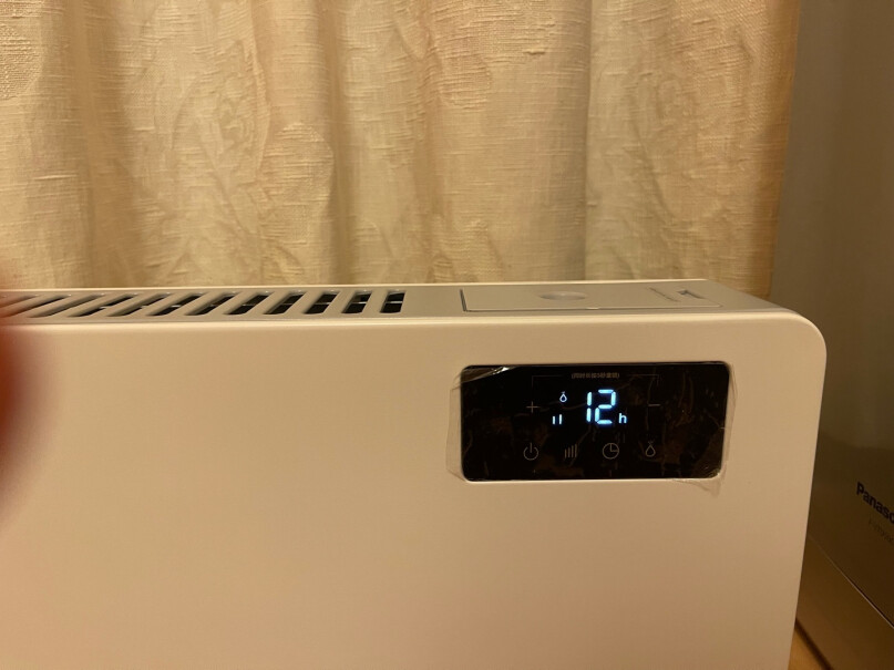 松下取暖器电暖器靠近床用品会燃吗？