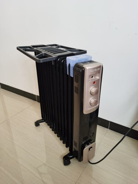 先锋Singfun取暖器电暖器电暖气片家用电热油汀13片全屋速暖低噪节能烘衣加湿DYT-Z215平方房间温度可达多少？