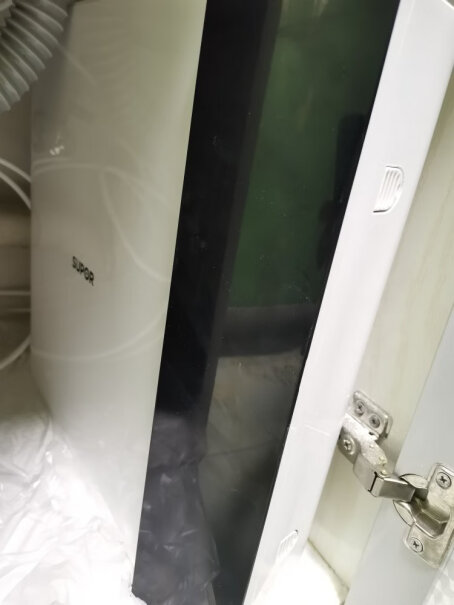 苏泊尔全屋净水套装超滤机+前置过滤器如何拔出进出口盖？