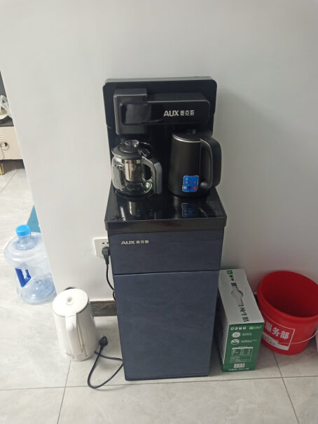 奥克斯茶吧机家用多功能智能遥控温热型立式饮水机可以放多大的水桶？