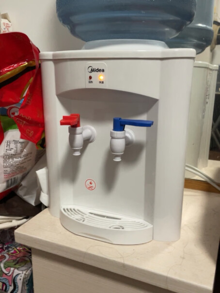 饮水机美的饮水机台式家用温热型桌面桶装水饮水器MYR720T好不好,评测分析哪款更好？