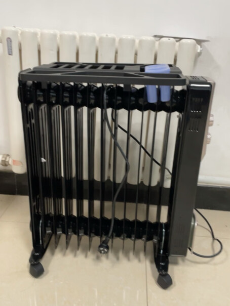 先锋Singfun取暖器电暖器电暖气片家用电热油汀13片全屋速暖低噪节能烘衣加湿DYT-Z2使用会有生意吗使用会有声音吗？