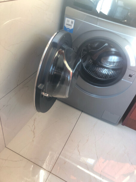 海尔滚筒洗衣机全自动10公斤洗烘一体请问真实购买顾客洗涤声音和脱水声音大不大？能接受吗？