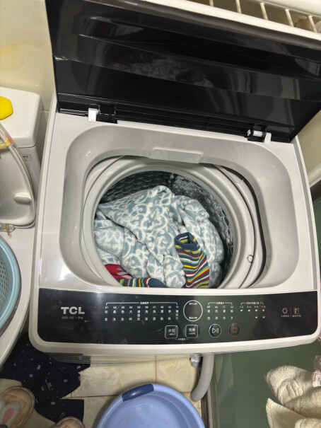 TCL XQB70-36SP请问下收到的洗衣桶是倾斜的还是平的？