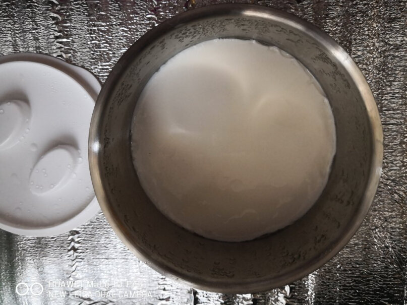 九阳家用全自动小型酸奶机精准控温SN－10J91内胆是不锈钢的还是玻璃材料？