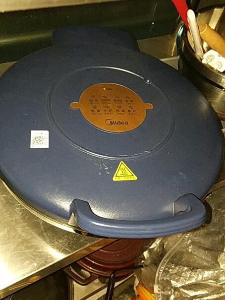 美的MC-JK30P301这个烤盘是什么材质的？