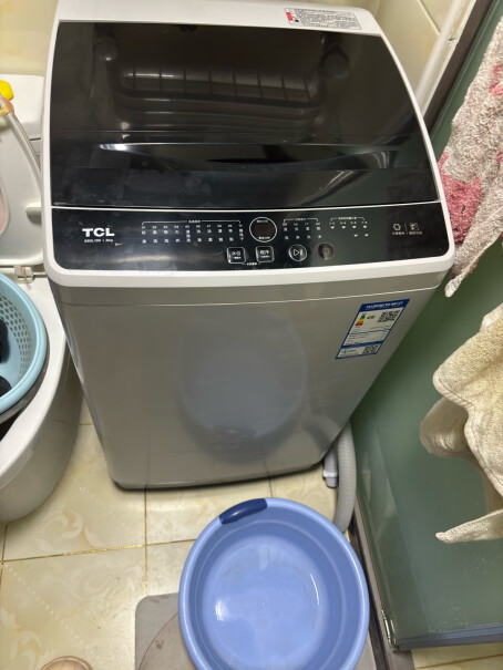 TCL XQB70-36SP请问下收到的洗衣桶是倾斜的还是平的？