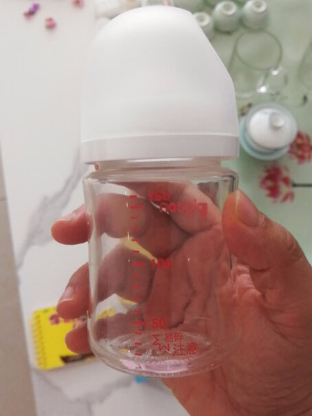贝亲奶瓶新生儿 宽口玻璃奶瓶 160ml奶嘴味道有异味吗，新生儿使用推荐购买吗？