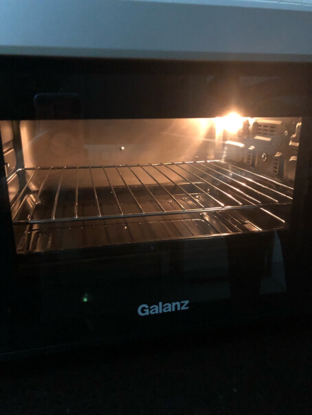 格兰仕电烤箱GalanzK1332控温大容量精准请问烤的鸡翅干不干，不会水水的吧？