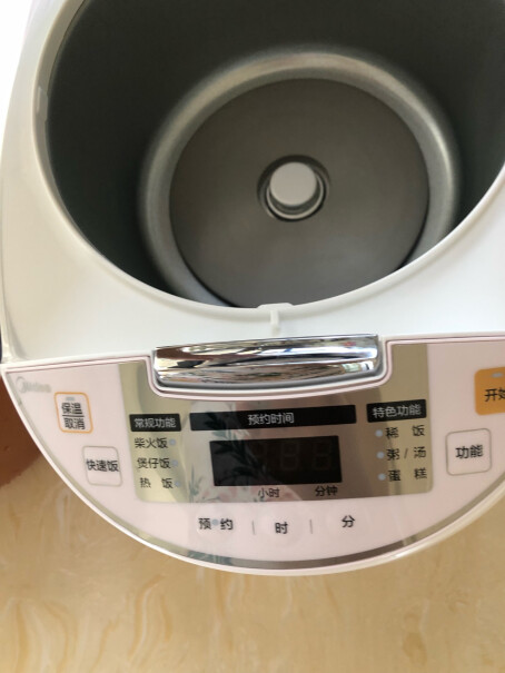 美的智能电饭煲家用微压闷香能煮几量杯？