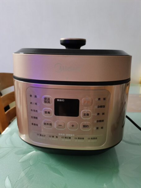 美的提鲜系列智能电压力锅5L家用多功能不粘双胆高压快煮上蒸下煮煮好饭多久时间？