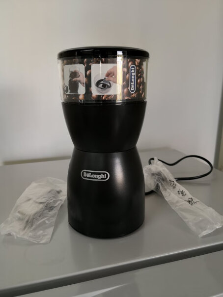 德龙咖啡机趣享系列半自动咖啡机我用的这个出咖啡是一滴一滴的，是压粉太用力了吗，油脂也好少？