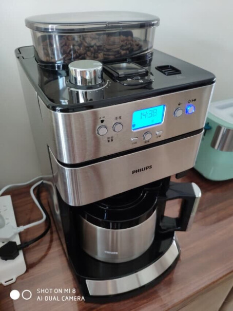 飞利浦咖啡机家用全自动滴滤式带磨豆保温预约功能请问这个怎么清理啊？ 显示要除垢了 但是不会？