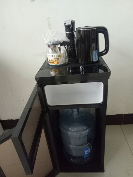 扬子饮水机家用茶吧机立式即热下置式A5传奇黑-高性价比温热型请问取水时，水到位了，水会自动停下吗？
