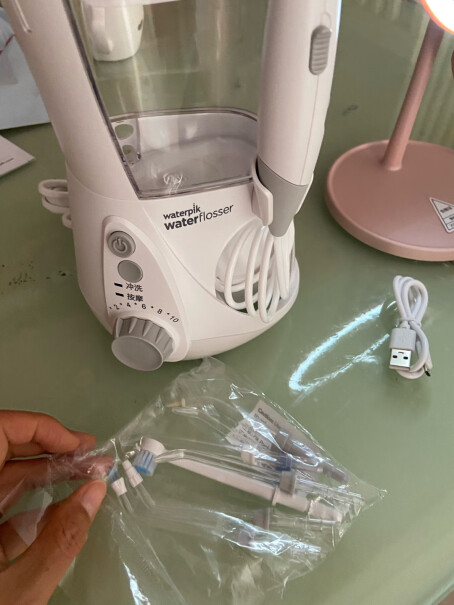 洁碧冲牙器一个人用纠结选择台式款还是便携款。