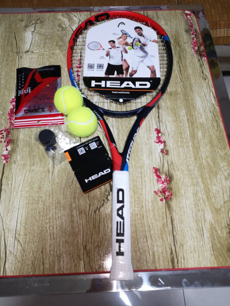 海德HEAD网球拍PRO全能拍子和线一起实际称重多少克？