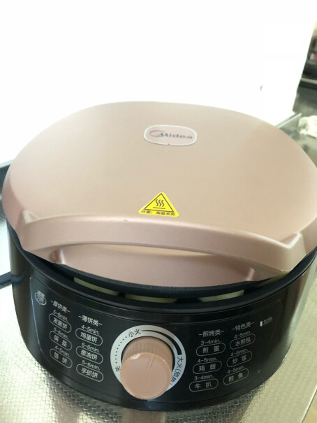 美的电饼铛家用双面加热电饼档请问这个锅用后怎么清洗，感觉水要流进开关里？