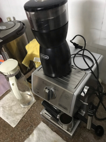 德龙咖啡机趣享系列半自动咖啡机這個和ECO310哪個好？