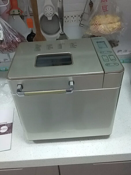 东菱Donlim烤面包机厨师机亲，将核桃仁葡萄干直接放面包桶中可以？因为干料盒不能自动投料，正处理中！
