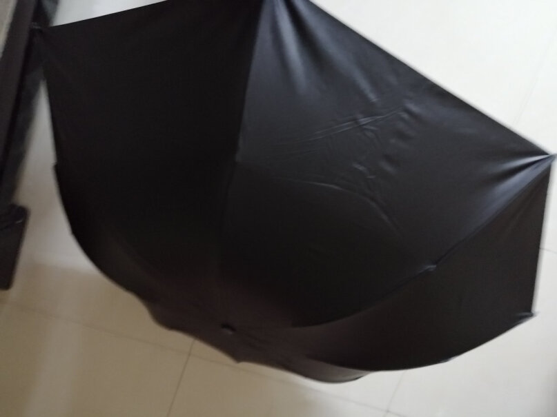 大号折叠黑胶晴雨伞男女遮阳伞防晒伞小黑伞太阳伞骑自行车的话会不会不好拿？